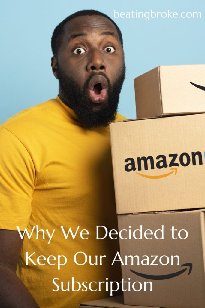 Man with a surprised expression on his face holding a stack of Amazon boxes